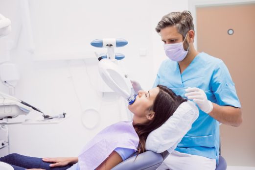 patient-receiving-dental-treatment_107420-65443 patient-receiving-dental-treatment_107420-65443